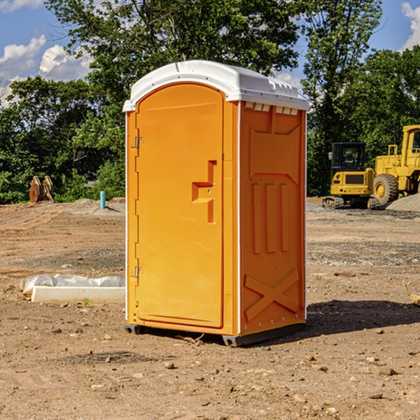 how often are the portable restrooms cleaned and serviced during a rental period in Lignum